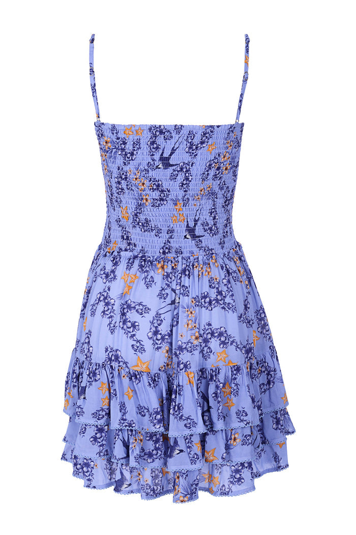 Alamy mini dress in periwinkle with smocked bodice, adjustable straps, navy and orange starfish print, and tiered ruffle skirt