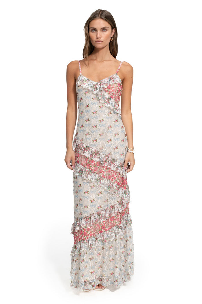 Alana maxi dress with adjustable straps, tiered ruffle detailing, and allover pattern detail print in white, coral, and pastel tones