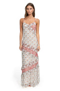 Alana maxi dress with adjustable straps, tiered ruffle detailing, and allover pattern detail print in white, coral, and pastel tones