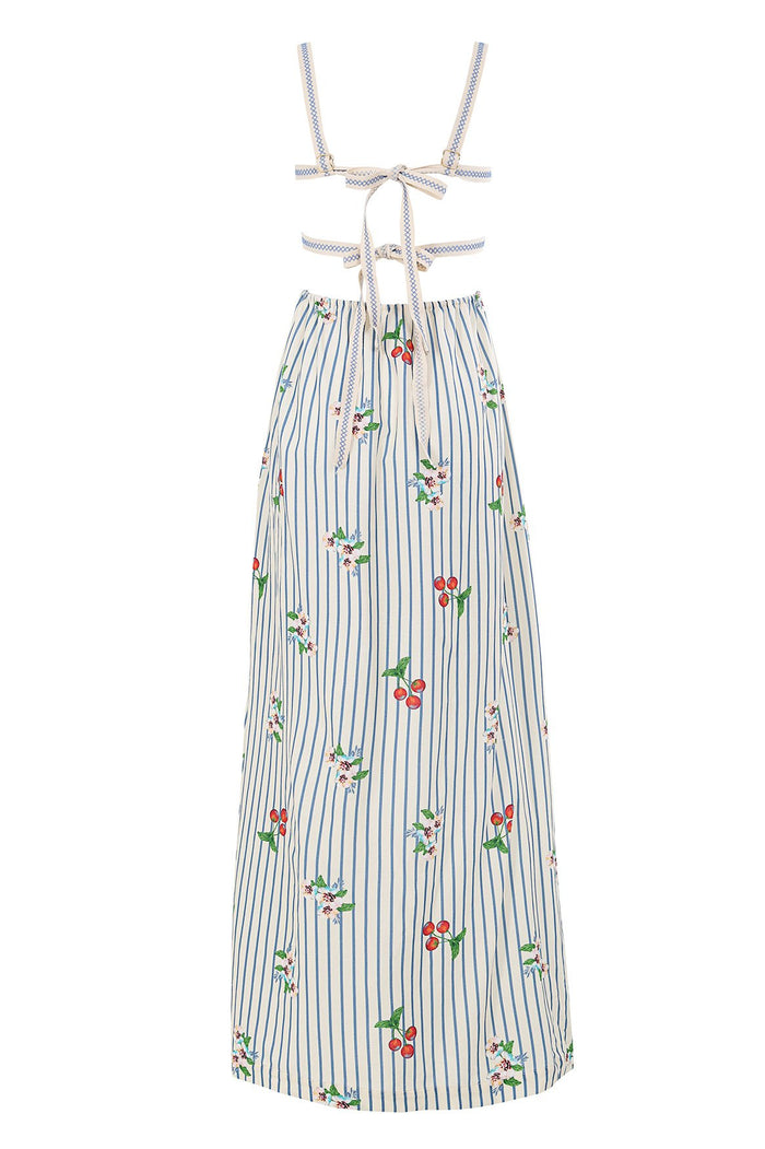 Ameli maxi dress in white with blue vertical stripes and cherry embroidery, featuring cutout waist with tie closures