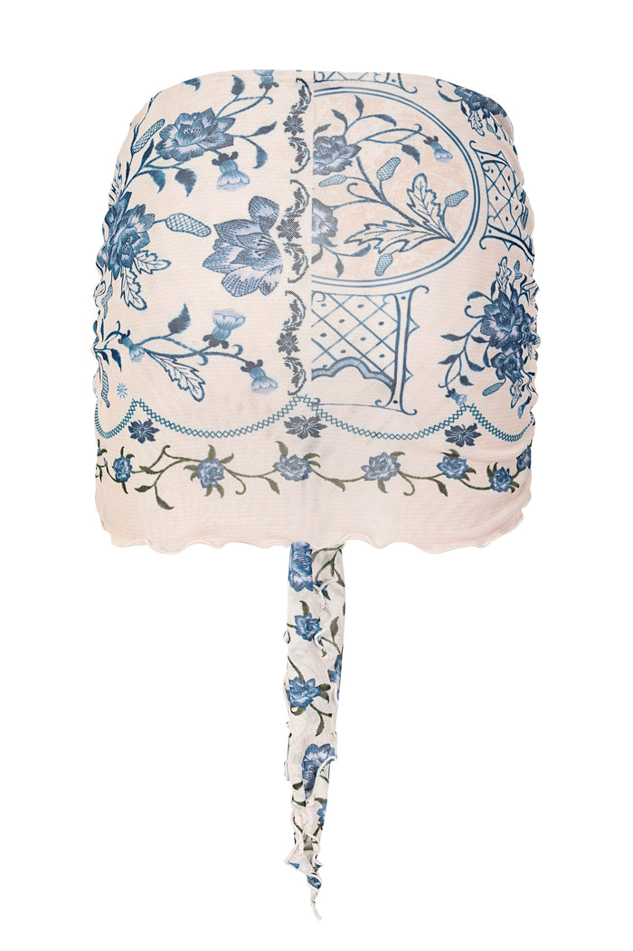 Aranxa pareo cover-up in cream with blue pattern detail print featuring garden chair and lattice design, with scalloped trim and tie detail