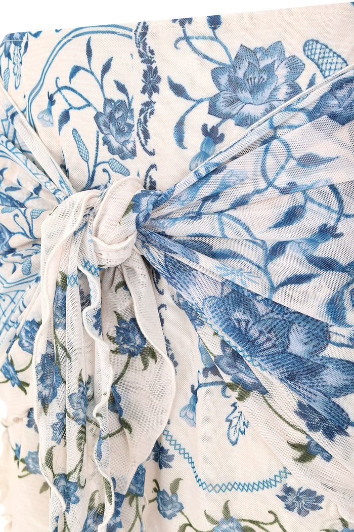 Aranxa pareo in lightweight mesh with blue pattern detail print on cream background and front knot detail