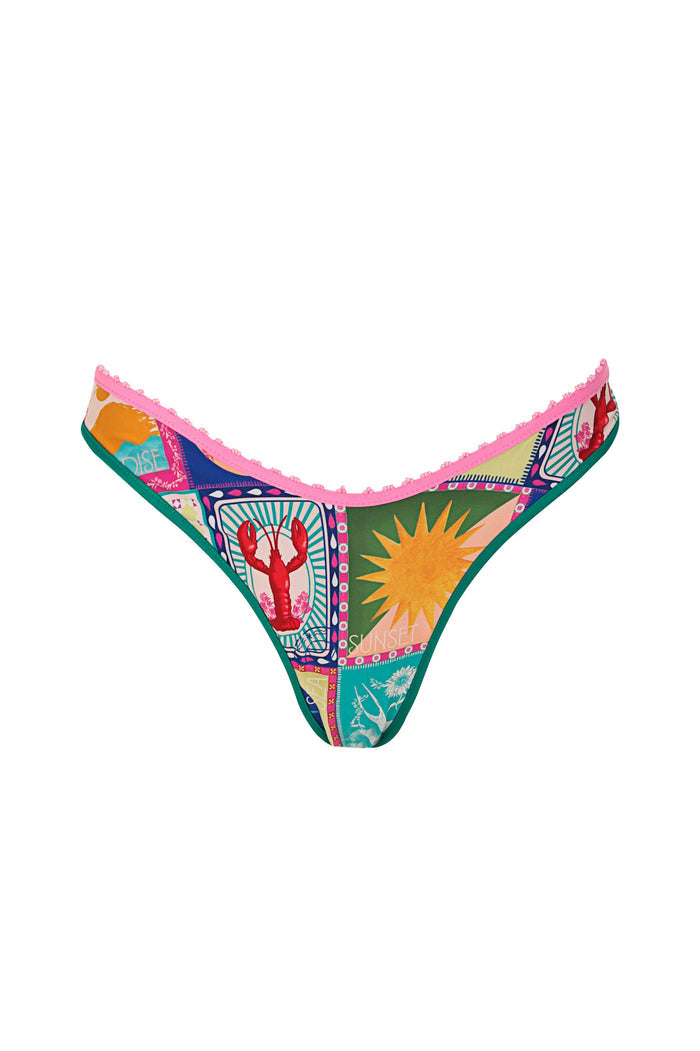 Avy bikini bottom in green with multicolor placement print featuring lobster, sun, coral, and geometric patterns with pink ruffle trim