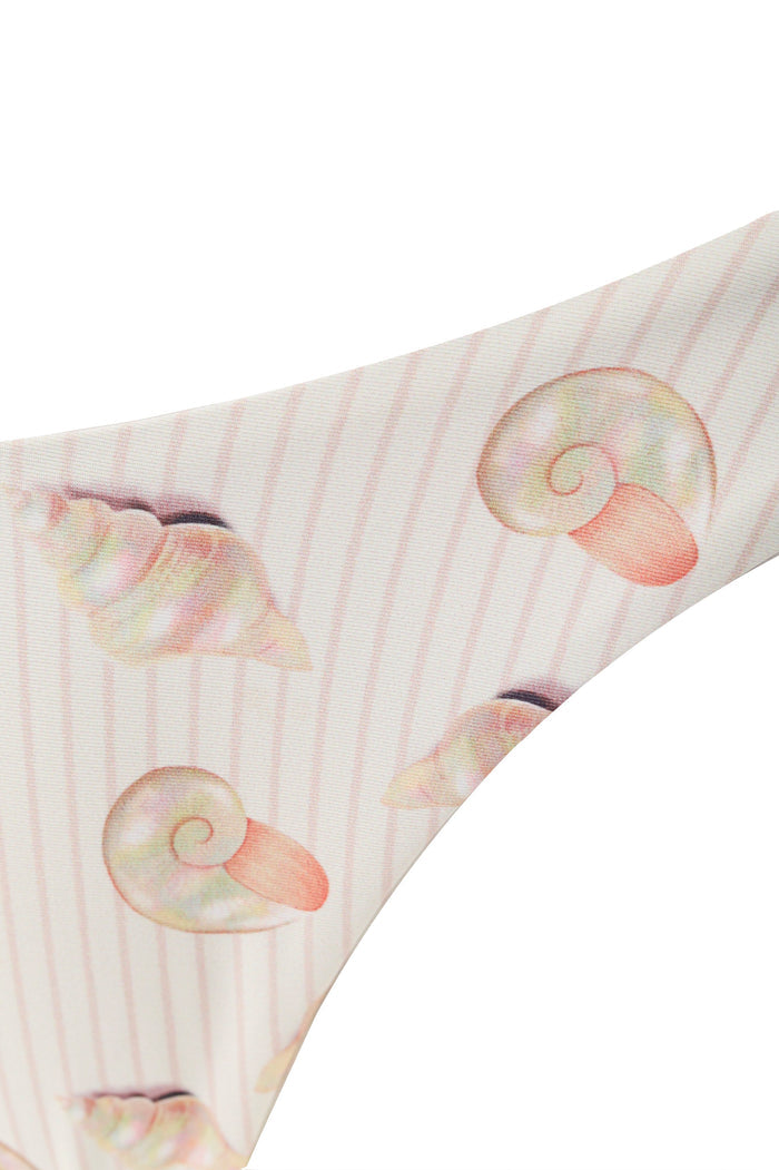 Avy bikini bottom in white with coral pink stripes and watercolor seashell print in soft pastel tones