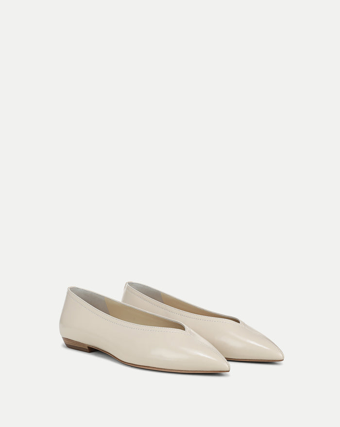 Veronica Beard Cream leather pointed-toe ballet flats with a V-cut vamp.