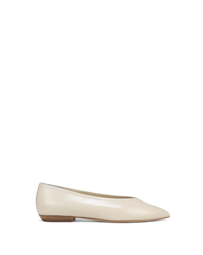 Veronica Beard Cream patent leather ballet flats with pointed toe.