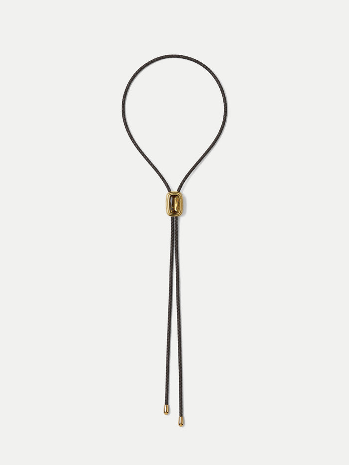 Veronica Beard Black braided leather bolo tie with gold hardware.