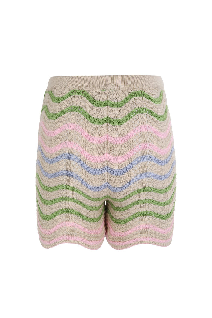 Carolyn Shorts in beige knit with horizontal zigzag stripes in green, pink, and blue, featuring scalloped hem