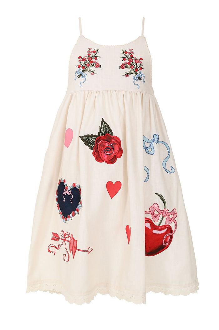 Capri kids' dress in ivory with scattered embroidered red roses, blue ribbons, pink and red hearts, and scalloped trim