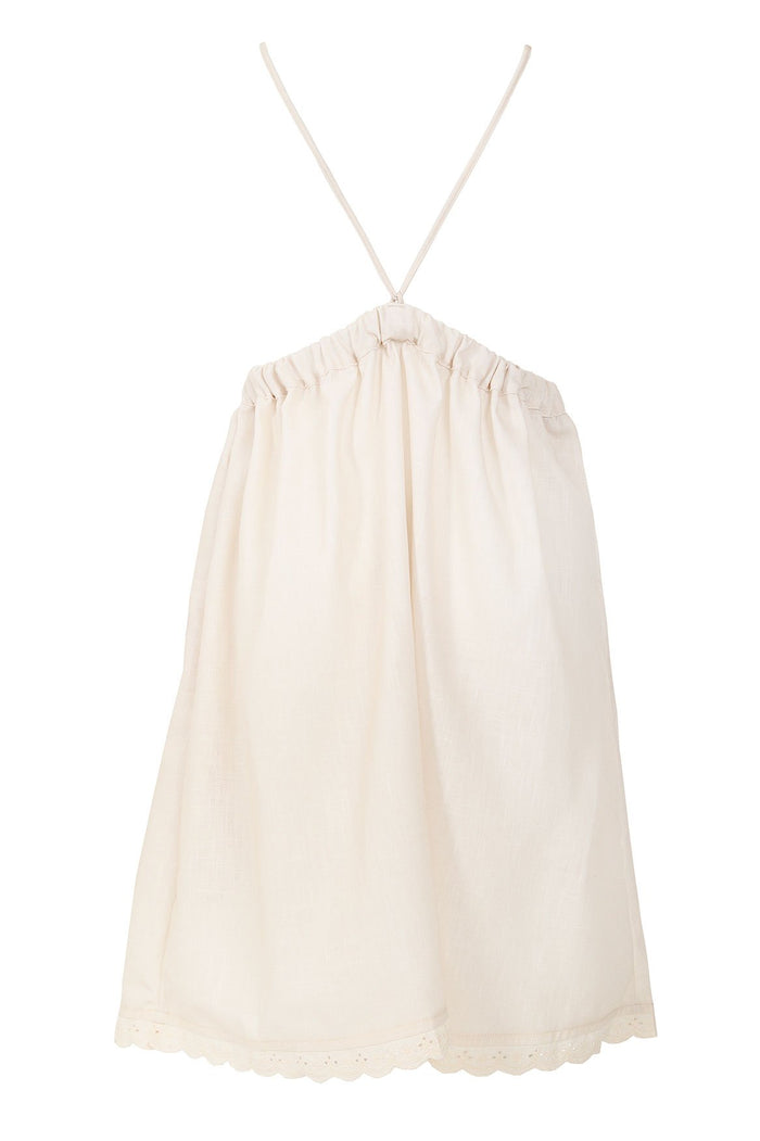 Cream halter-neck girls' dress with gathered neckline, eyelet lace trim at hem, and relaxed silhouette