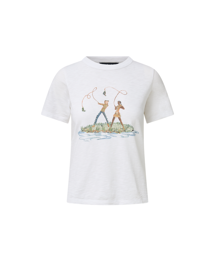 Veronica Beard White graphic t-shirt and blue geometric patchwork jeans.