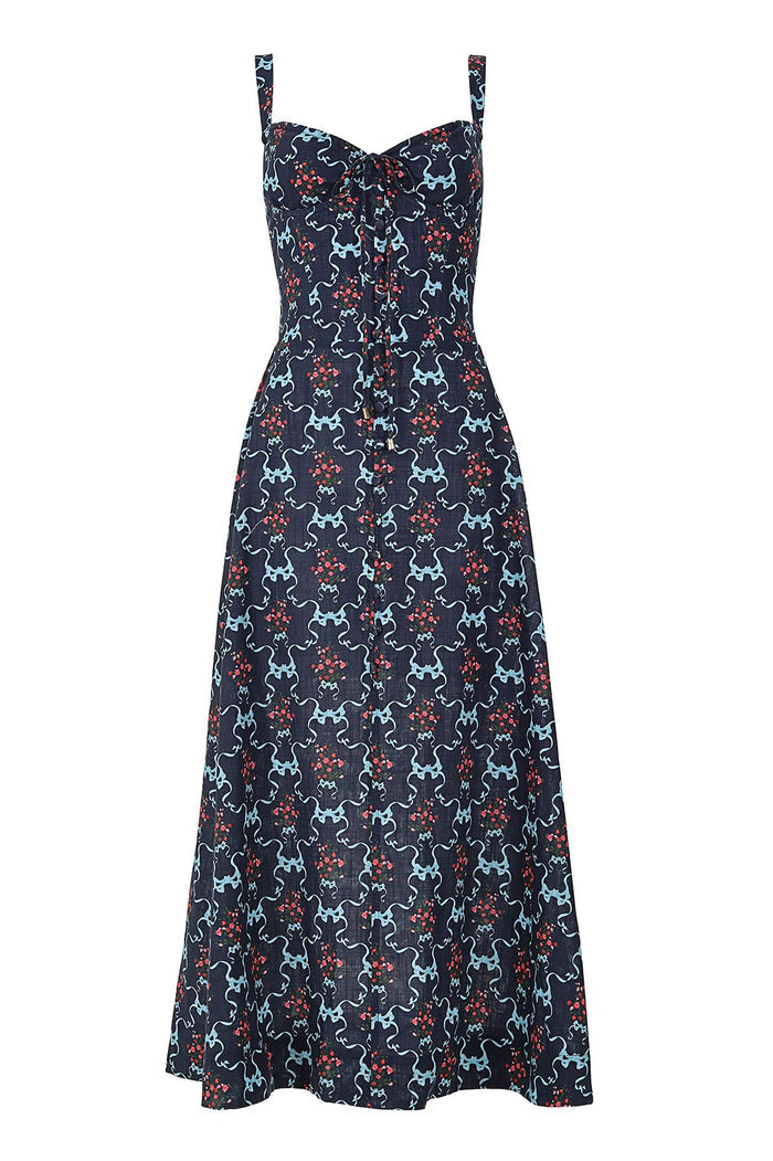 Navy midi dress with sweetheart neckline and shoulder straps in light blue wavy line pattern with coral and turquoise pattern detail accents