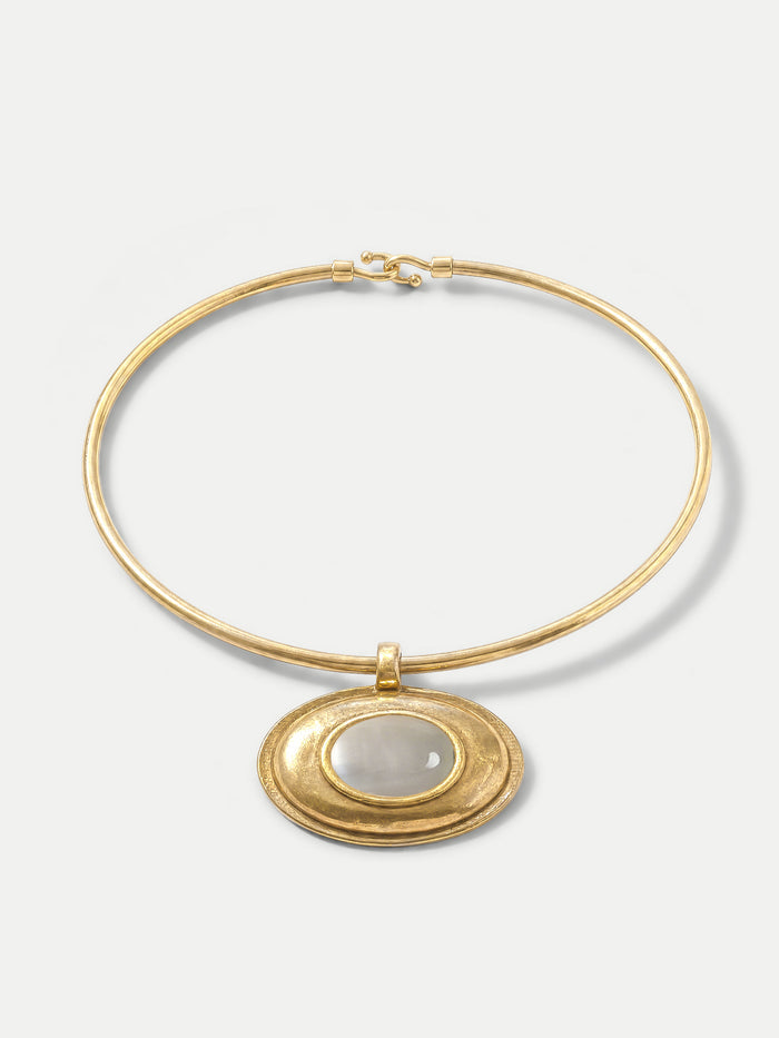 Veronica Beard Gold choker necklace with oval mother-of-pearl pendant.