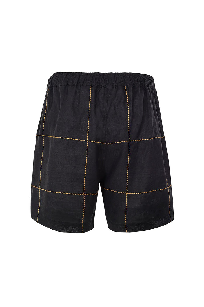 Black linen shorts with gold embroidered grid pattern and elastic waistband