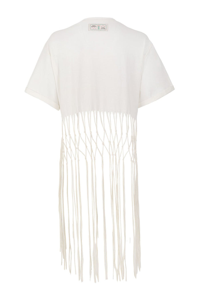 White oversized t-shirt with long handwoven fringe trim at hem and embroidered detail at neckline