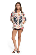 Chrissy Shirt in cream with navy heart-shaped panels, pattern detail print, front button closure, and rolled sleeve tabs