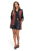Black and terracotta panel shirt with pattern detail outline print, scalloped trim, and bead dot accents along vertical panels