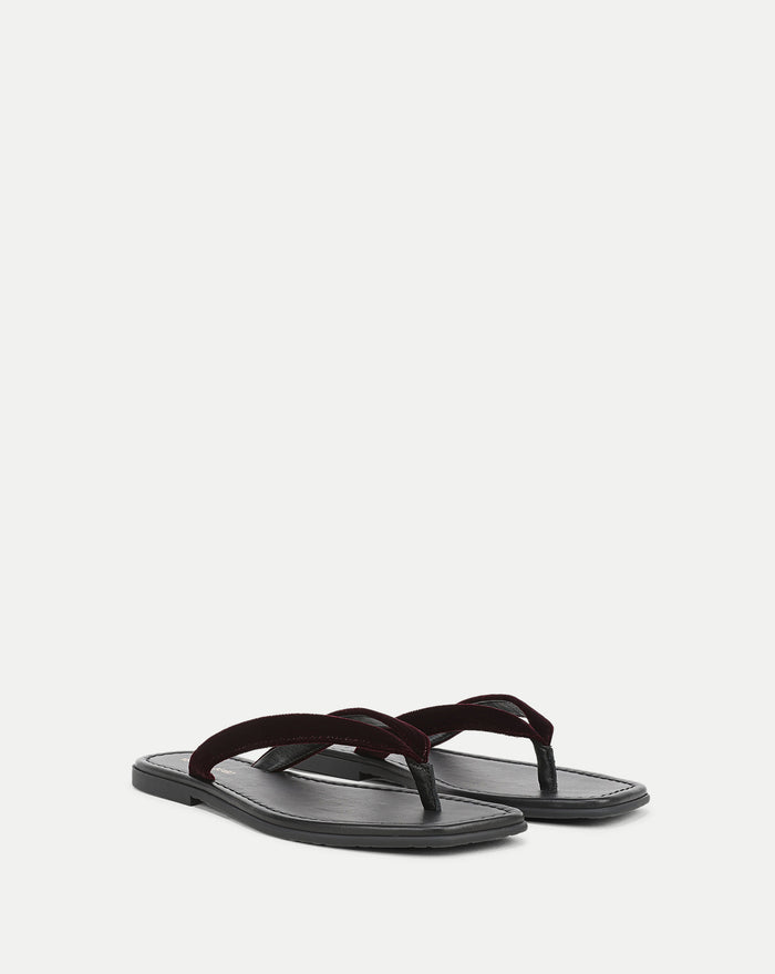Veronica Beard Black leather sandal with a dark red velvet strap.