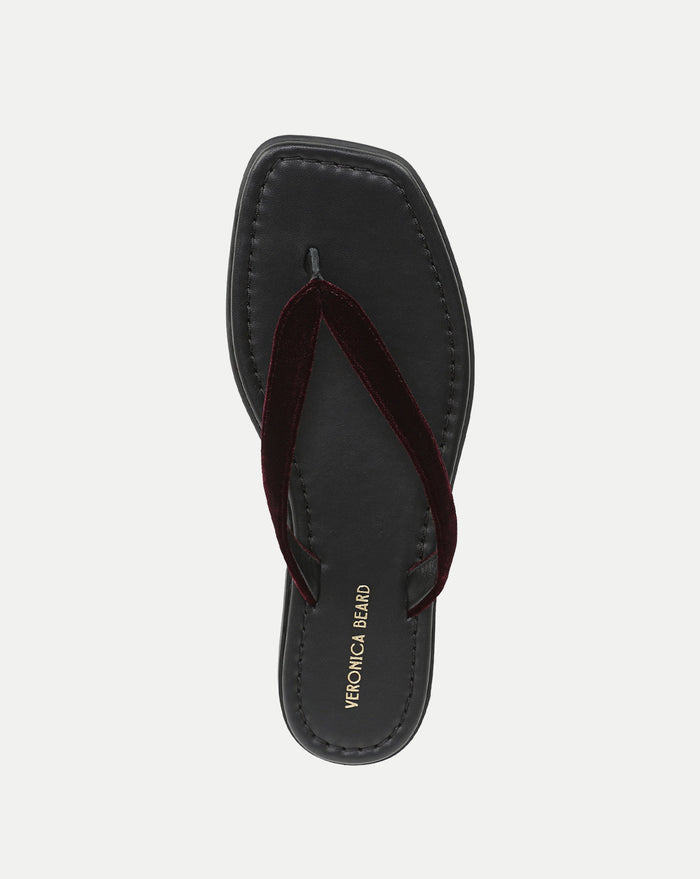 Veronica Beard Black leather sandal with a dark red velvet strap.