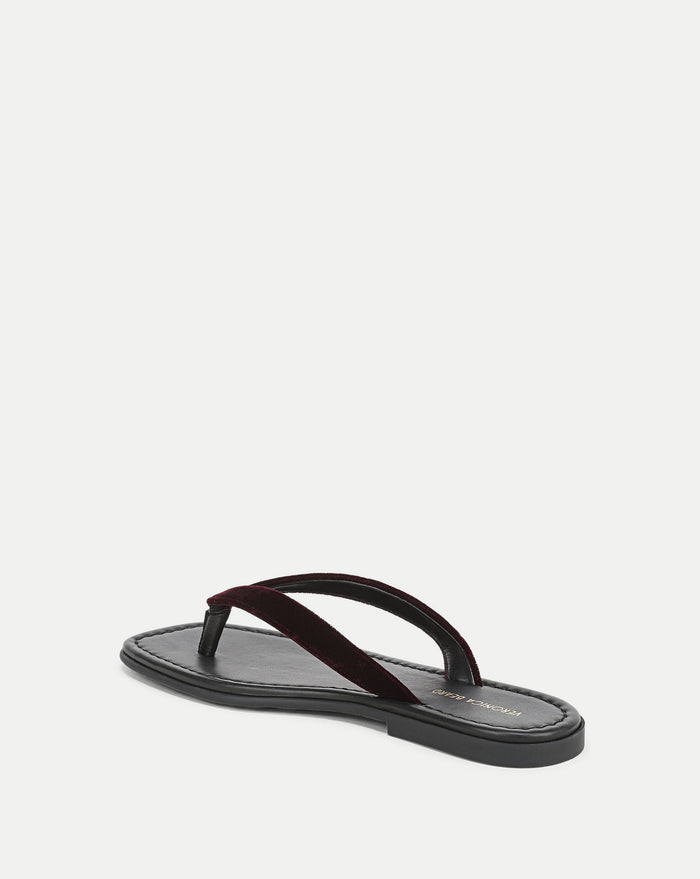 Veronica Beard Black leather sandal with a dark red velvet strap.