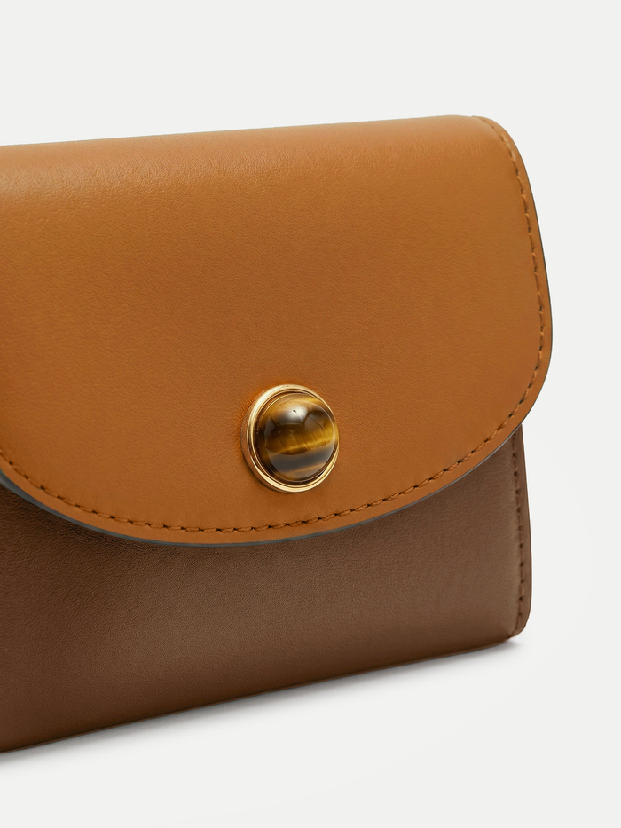 Veronica Beard Brown and tan leather wallet with a tiger's eye snap.