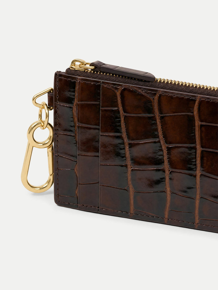 Veronica Beard Brown crocodile-embossed leather cardholder with gold zipper and clasp.