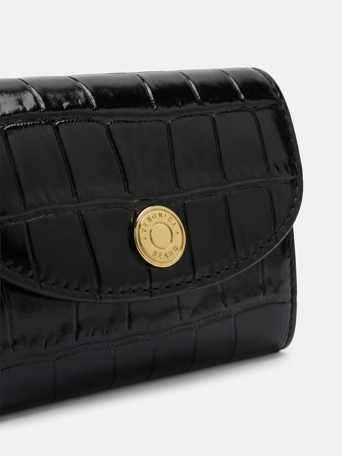 Veronica Beard Black crocodile-embossed leather wallet with gold button closure.