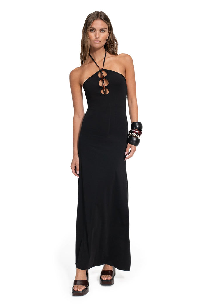 Black halterneck maxi dress with front circular cutouts and beaded ring accents