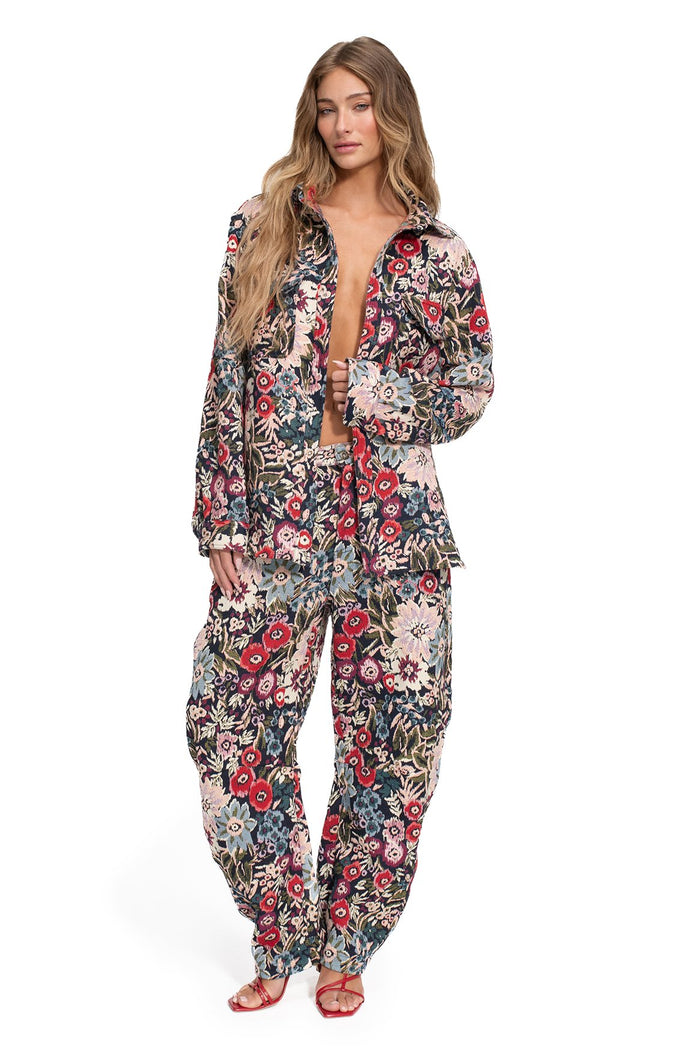 Fallon Pants in textured jacquard with all-over floral print in red, pink, blue, and green tones