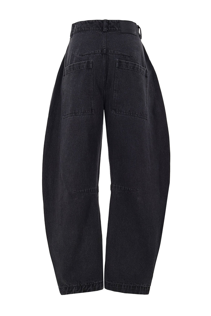 Black denim wide-leg pants with relaxed fit, back view showing patch pockets and belt loops