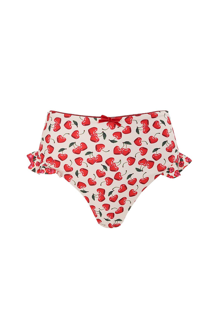 High-waisted bikini bottom with red cherry print on cream background and ruffle side details