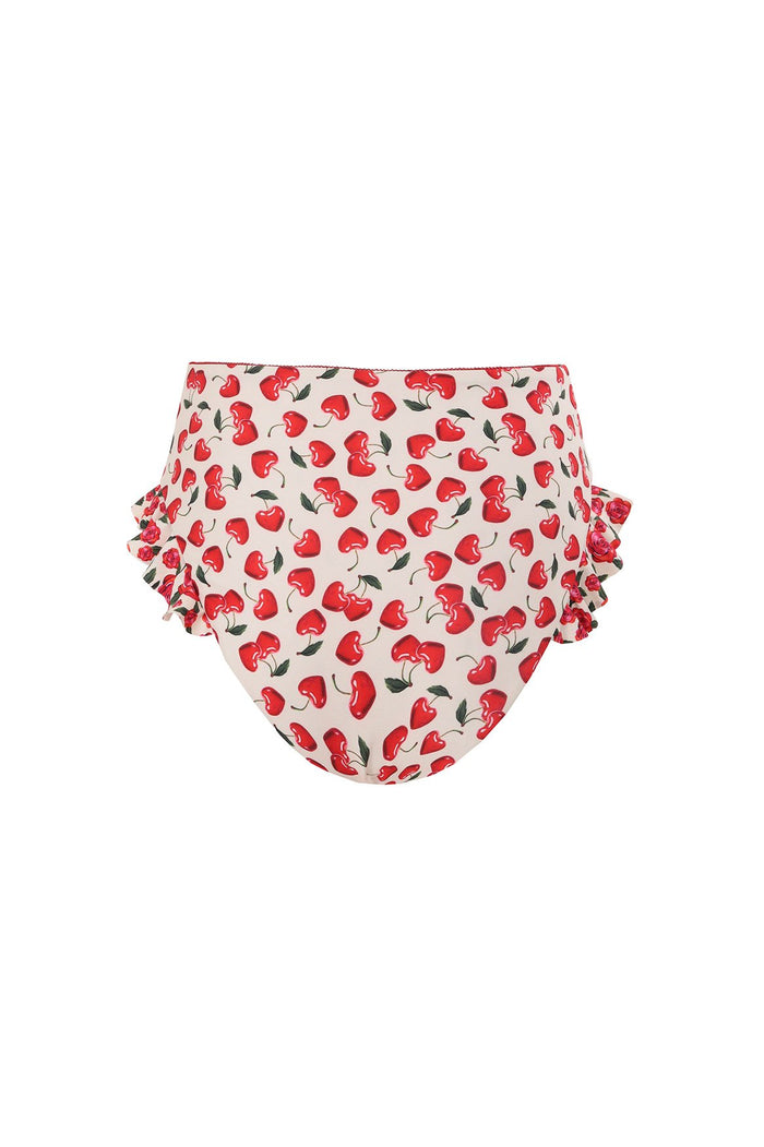 High-waisted bikini bottom in cream with red cherry print and green leaves, featuring ruffle details on sides