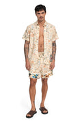 Georgie Men's Shorts in cream with all-over floral print featuring orange, blue, and green botanical elements
