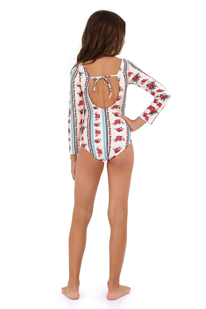 White long-sleeve swimsuit with vertical stripes and pattern detail print, featuring an open keyhole back with tie detail