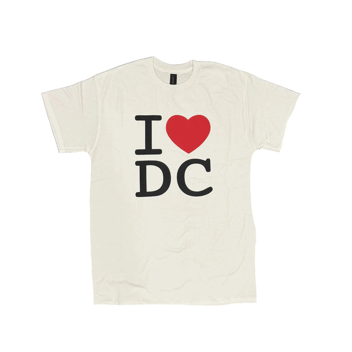 White t-shirt with 'I ❤️ DC' design on a black table.