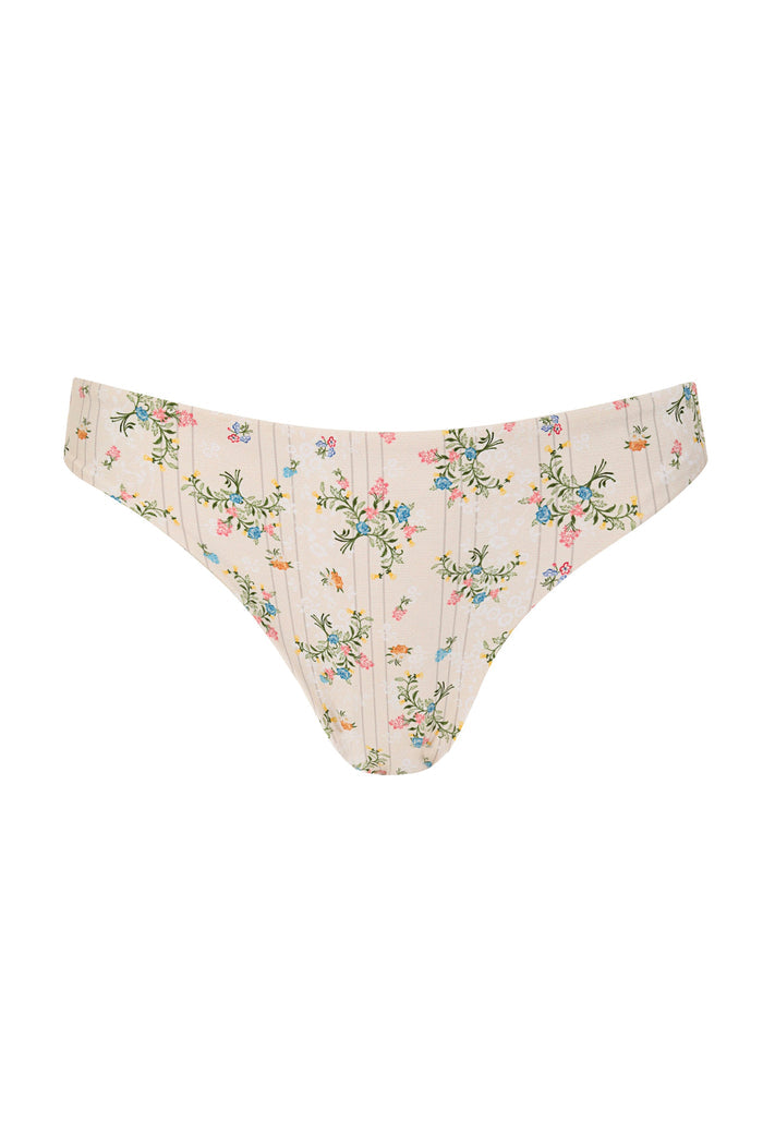 Ilu bikini bottom in blush pink with vertical ribbed texture and scattered pattern detail print in pink, blue, yellow and green