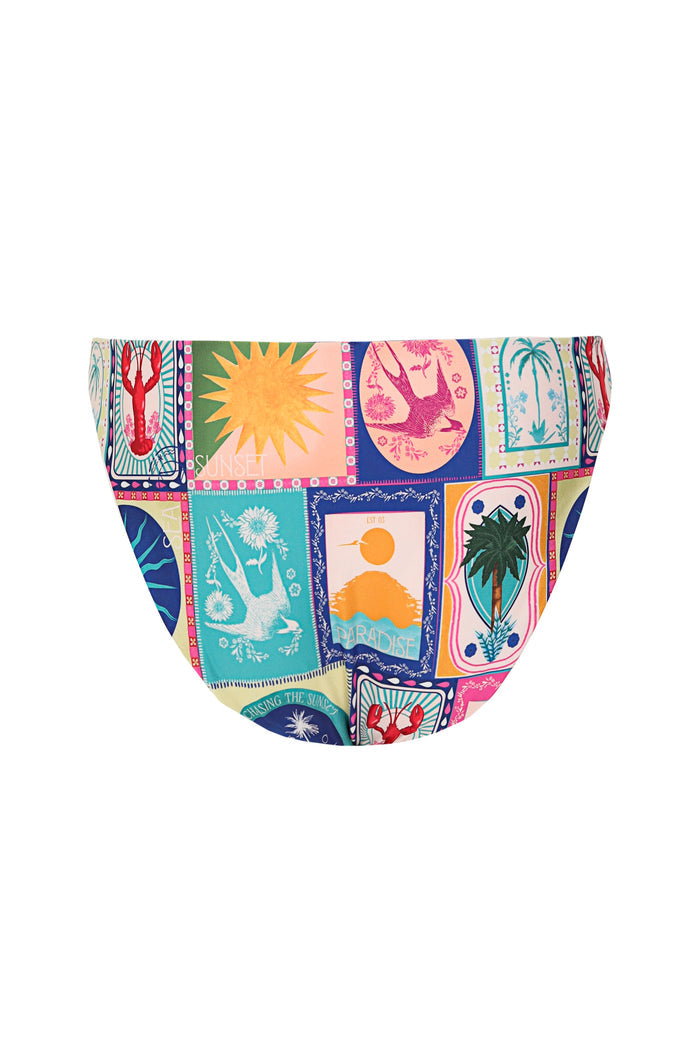 Bikini bottom with vibrant patchwork print featuring framed suns, palm trees, and tropical panels in pink, orange, turquoise, and navy