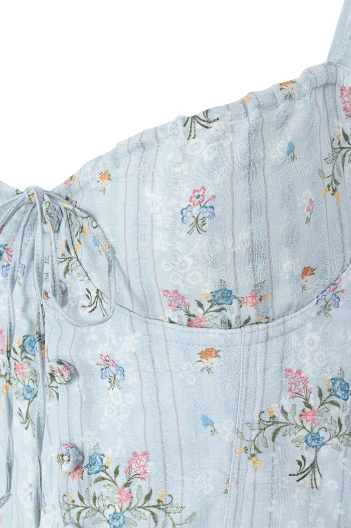 Light blue mini dress with embroidered pattern detail pattern, featuring off-shoulder neckline, puff sleeves, and smocked bodice detail