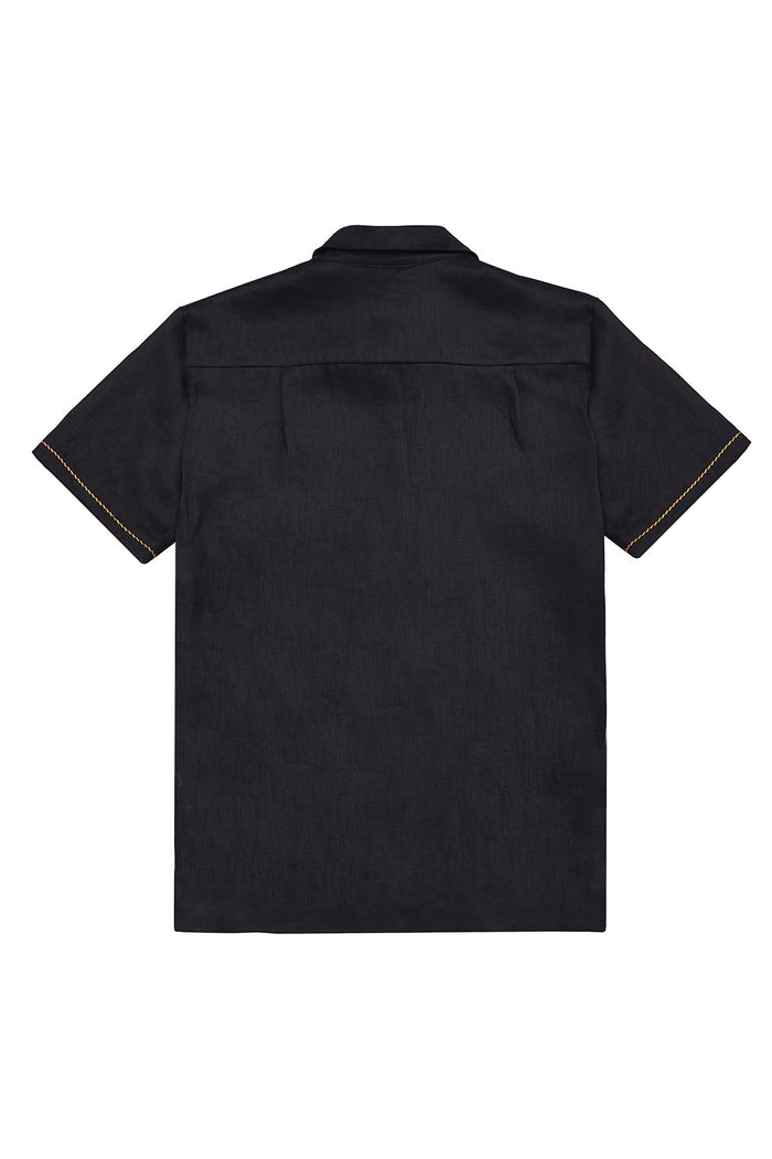 Black short-sleeve button-up shirt with golden contrast stitching along sleeve hems, back view