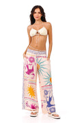 Wide-leg pants in blush with placement print featuring sun bursts, pattern detail graphics, and decorative border details