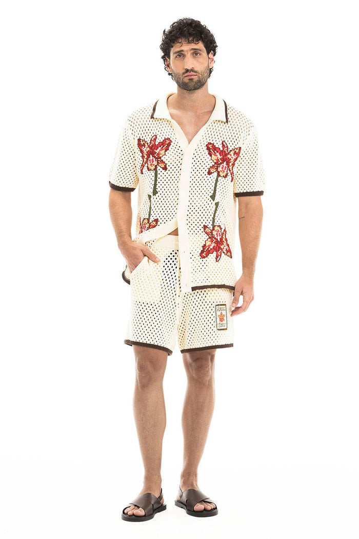 Jared Men's Shirt in cream crochet-like knit with open-weave texture, red embroidered flowers, and brown contrast trim on collar and sleeves