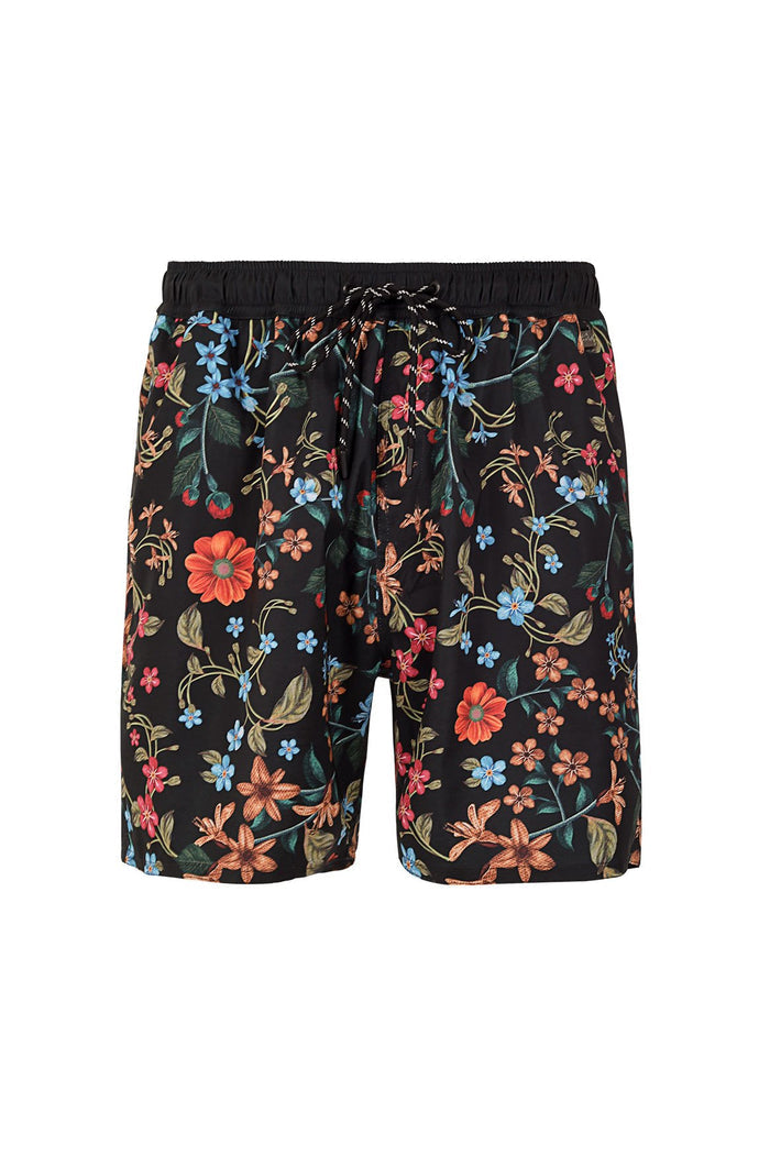 Black swim trunks with vibrant floral print featuring coral, blue, pink, and peach flowers with green leaves and embroidered details