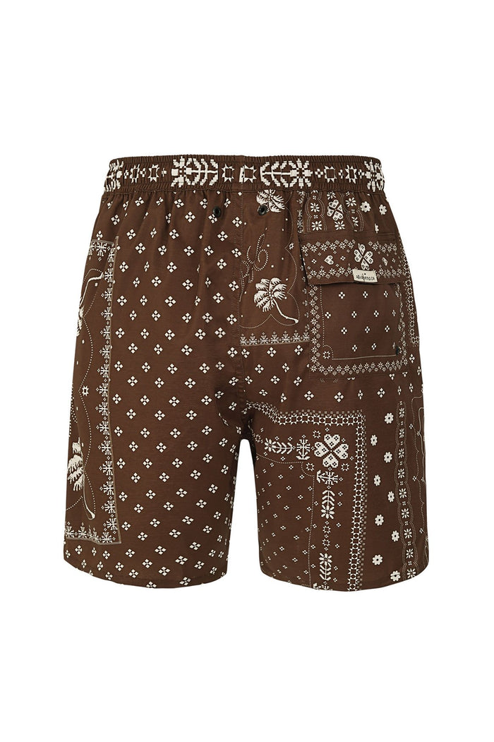 Brown swim trunks with white bandana-inspired print featuring geometric patterns, small florals, and decorative borders