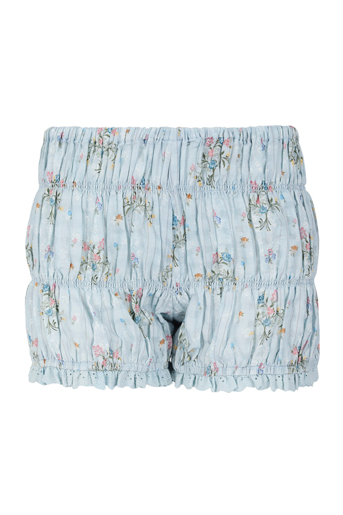 Light blue gathered shorts with ruched tiers, delicate pattern detail print, and scalloped lace trim