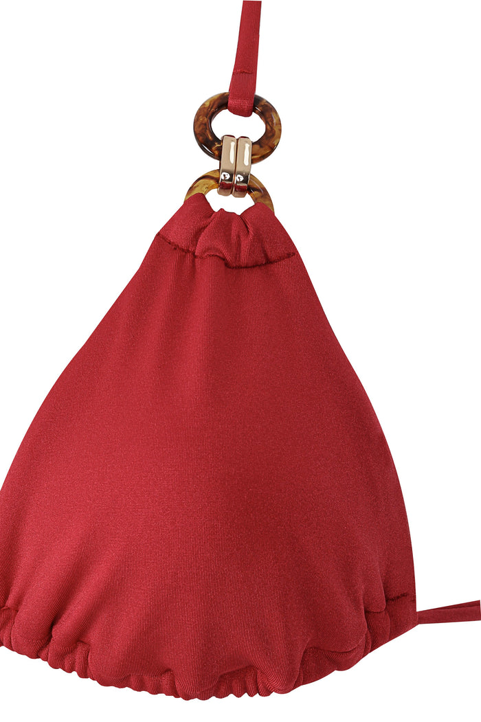 Red ribbed triangle bikini top with ruffle trim and tortoiseshell ring handles