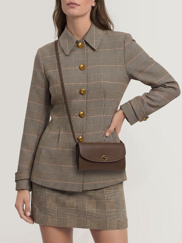 Veronica Beard Brown leather shoulder bag with gold clasp.