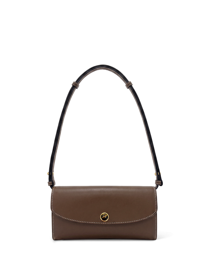 Veronica Beard Brown leather shoulder bag with white stitching and gold clasp.