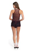 Black shorts with red cherry print, featuring layered ruffle details and racerback tank top, back view