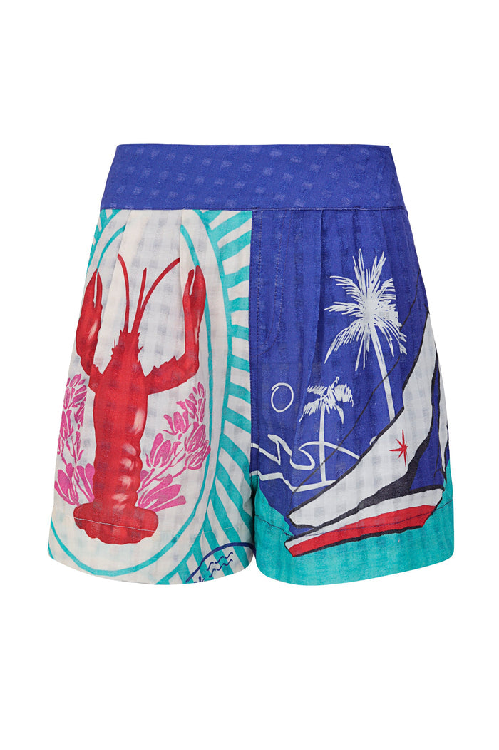Lia shorts with colorful placement print featuring palm trees, abstract shapes, and diagonal stripes in blue, turquoise, coral, and pink