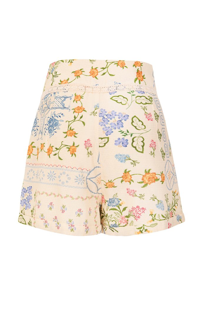 Cream shorts with multicolored pattern detail embroidery print and lace trim at waist